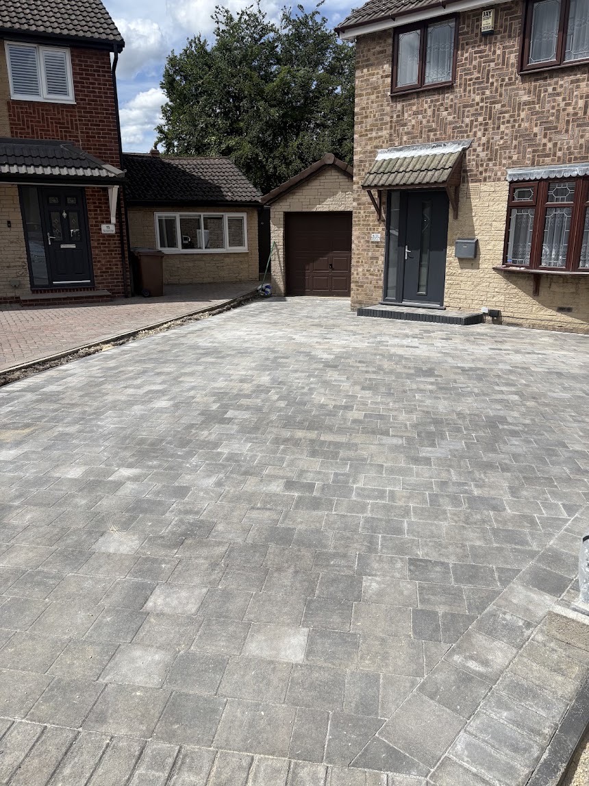Driveways project — Grey and charcoal block paved driveway with a full sweeping frontage.